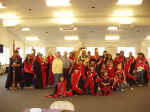 The Heinua Kwaan Native Dancers pose with Pastor Howard and Marge